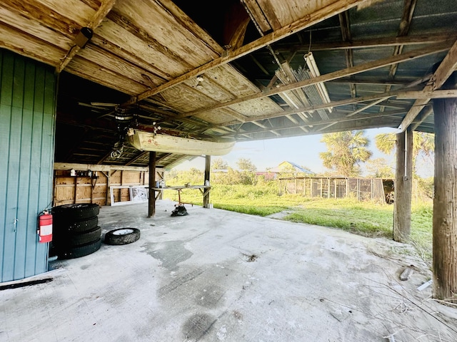 view of patio with an outbuilding