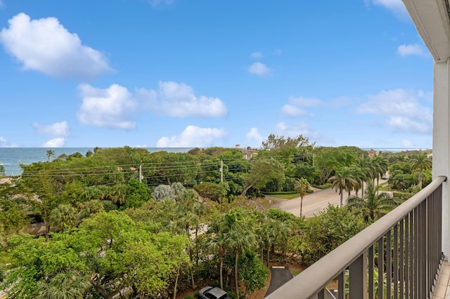 balcony featuring a water view