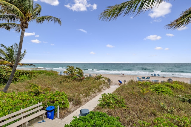 view of water feature with a beach view