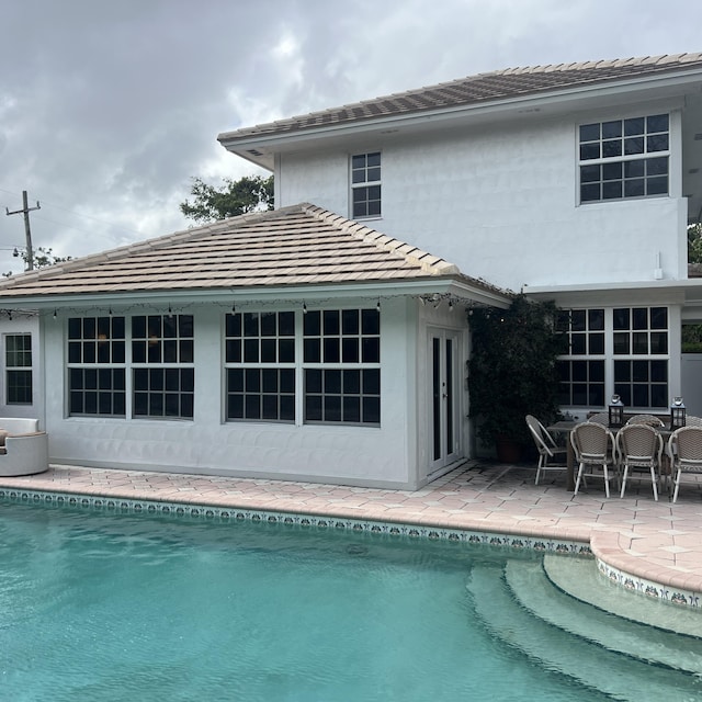 rear view of property with a patio area