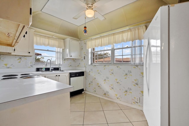 kitchen featuring ceiling fan, sink, white cabinets, and white appliances