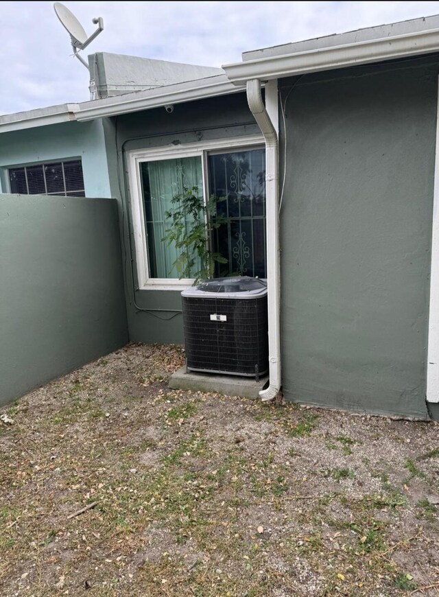 exterior space featuring central AC unit