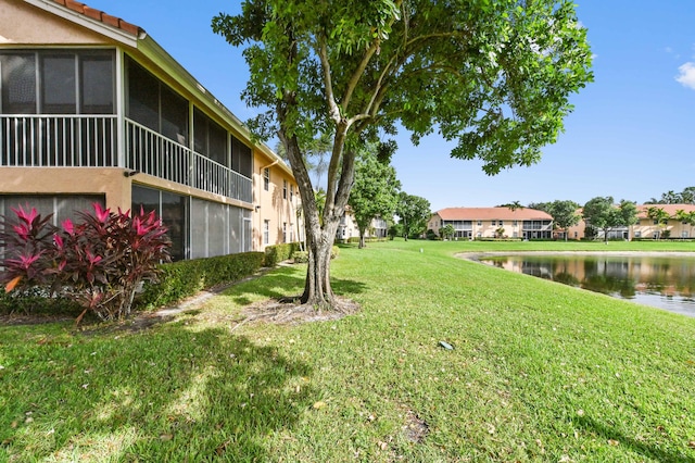 view of yard with a water view