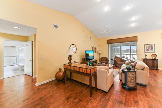 living room with dark hardwood / wood-style floors, vaulted ceiling, and ceiling fan