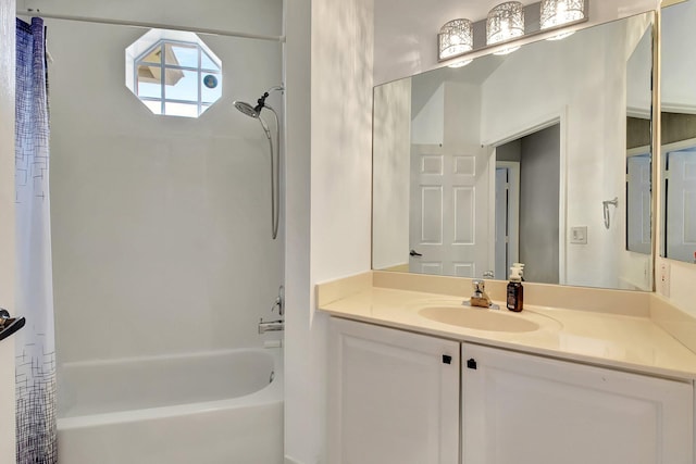 bathroom with vanity and shower / tub combo with curtain