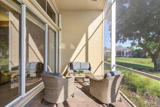 sunroom / solarium featuring a wealth of natural light