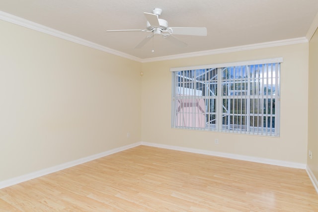 unfurnished room with ceiling fan, light wood-type flooring, and ornamental molding