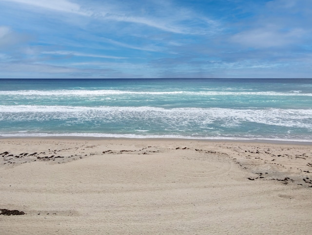 property view of water with a beach view