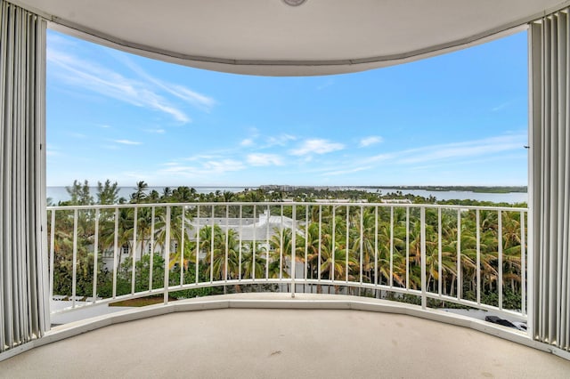 balcony featuring a water view