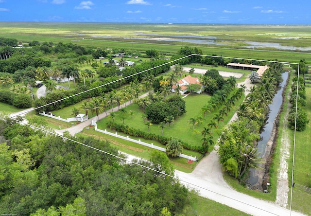 aerial view featuring a rural view and a water view