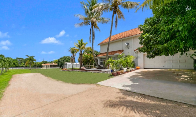 view of yard with a garage