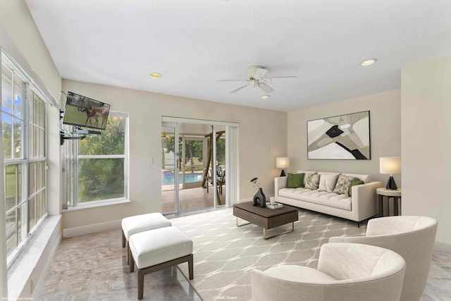 living room featuring ceiling fan