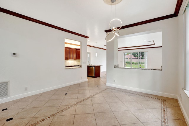 tiled empty room with crown molding