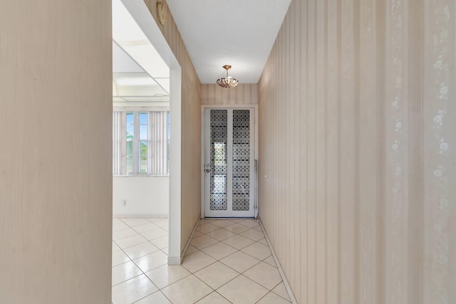 entryway featuring light tile patterned floors