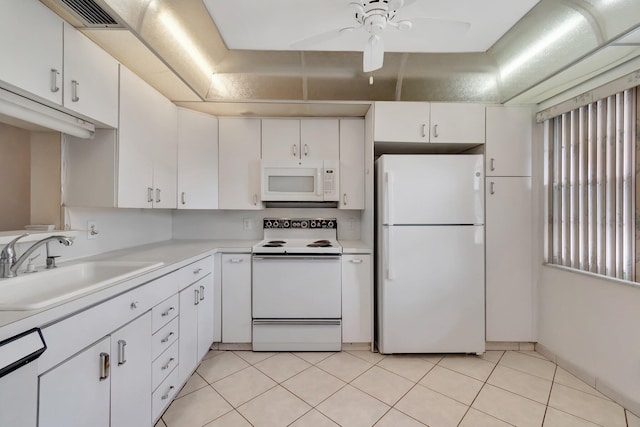 kitchen featuring ceiling fan, white cabinetry, white appliances, and sink