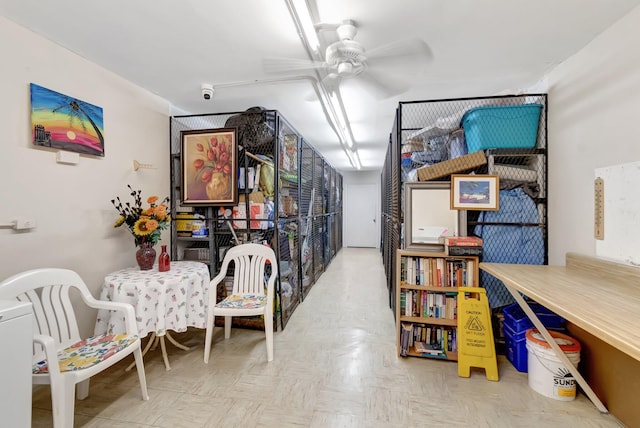 interior space featuring ceiling fan