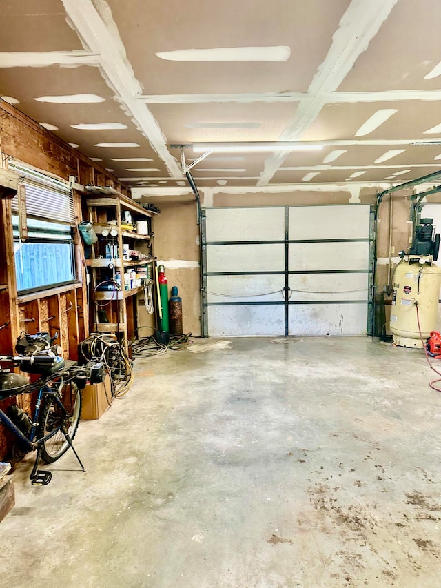 garage featuring water heater