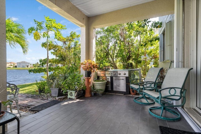 view of patio / terrace featuring a water view