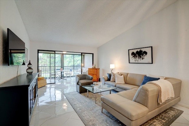 tiled living room featuring a textured ceiling and vaulted ceiling