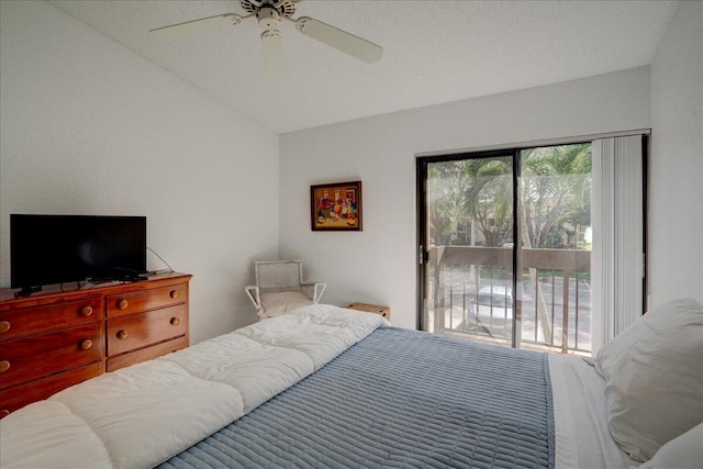 bedroom featuring a textured ceiling, access to outside, ceiling fan, and lofted ceiling