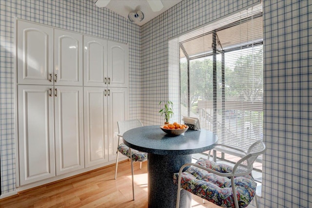 dining room with light wood-type flooring