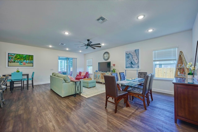 dining area featuring a wealth of natural light, dark wood-type flooring, and ceiling fan