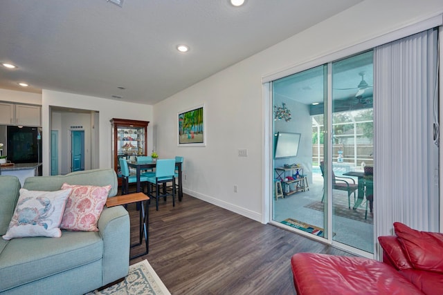 living room with dark wood-type flooring