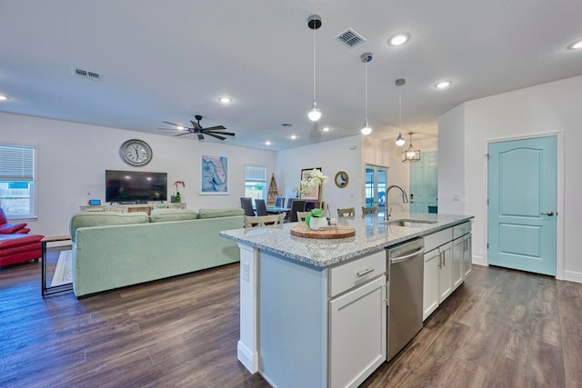 kitchen with sink, decorative light fixtures, dishwasher, white cabinets, and dark hardwood / wood-style floors