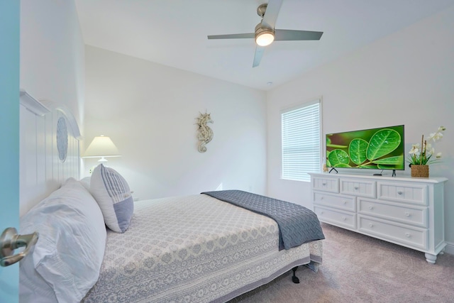 bedroom featuring ceiling fan and light colored carpet