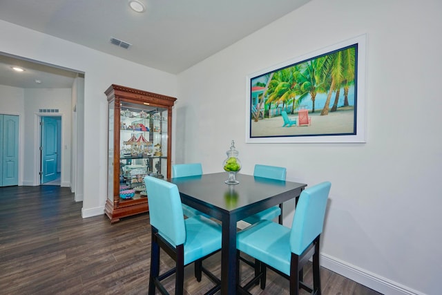 dining room featuring dark hardwood / wood-style floors