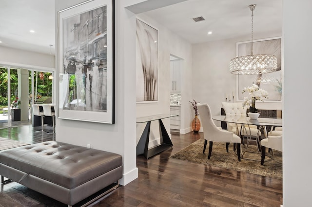 dining room with dark hardwood / wood-style flooring