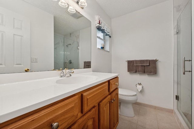 bathroom with walk in shower, tile patterned flooring, a textured ceiling, toilet, and vanity