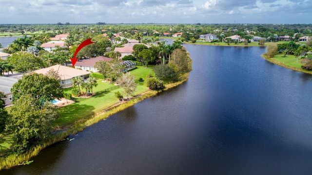 2233 SW Golden Bear Way, Palm City, FL 34990 - aerial overview of property's location with a nearby body of water and nearby suburban area