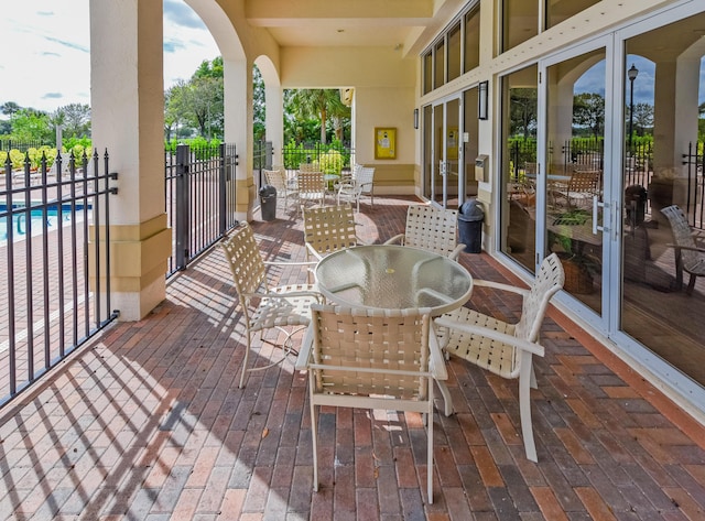 2233 SW Golden Bear Way, Palm City, FL 34990 - view of patio / terrace featuring outdoor dining space