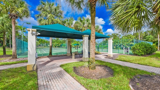 2233 SW Golden Bear Way, Palm City, FL 34990 - view of property's community featuring a tennis court and shuffleboard