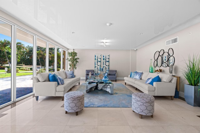 living room with light tile patterned floors