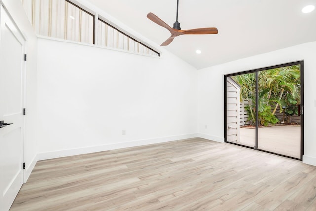 unfurnished room with light wood-type flooring, high vaulted ceiling, and ceiling fan