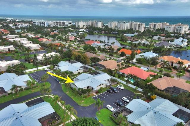 drone / aerial view featuring a water view