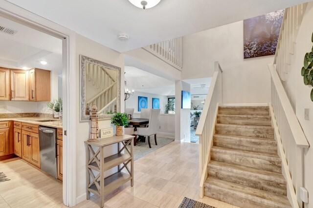 4744 S Ocean Blvd Unit C-112, Highland Beach, FL 33487 - stairs with a chandelier and recessed lighting