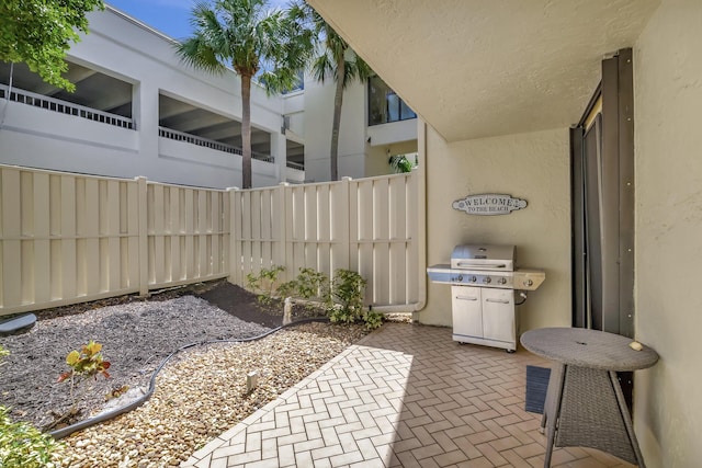 4744 S Ocean Blvd Unit C-112, Highland Beach, FL 33487 - view of patio / terrace featuring grilling area