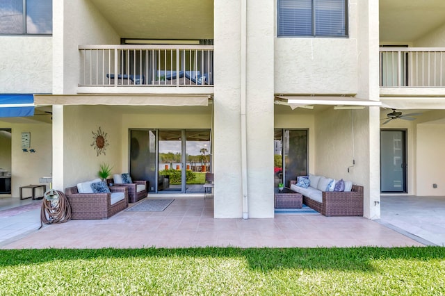 view of patio with an outdoor hangout area and ceiling fan