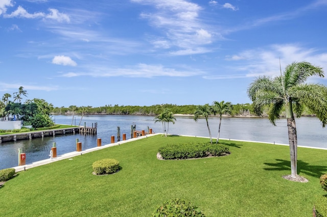 4744 S Ocean Blvd Unit C-112, Highland Beach, FL 33487 - dock area with a water view and a yard