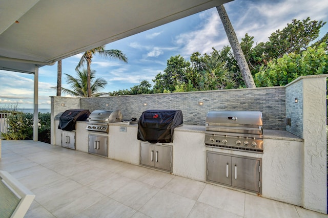 view of patio featuring area for grilling and grilling area