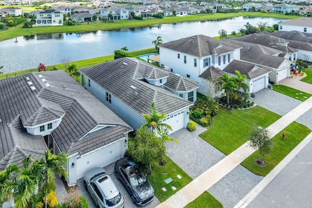 drone / aerial view with a water view