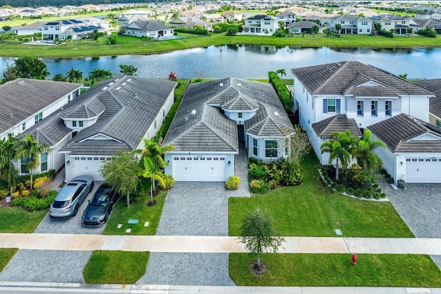 bird's eye view with a water view