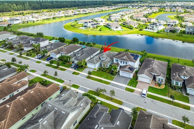 drone / aerial view featuring a water view