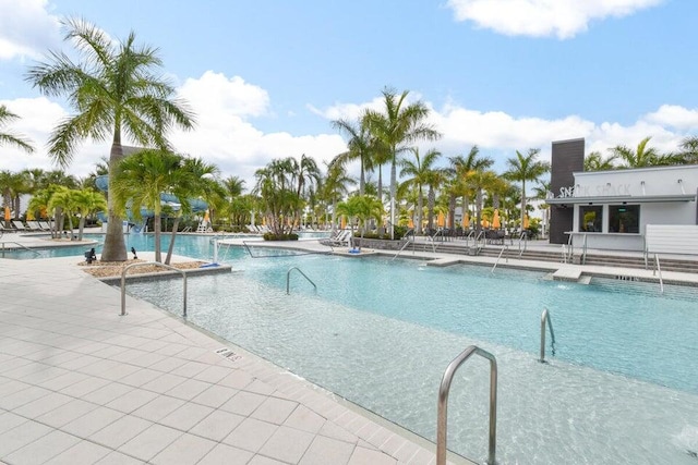 view of swimming pool featuring a patio