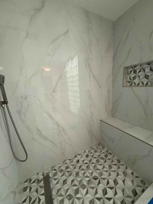 1127 Boca Cove Ln Unit 3, Highland Beach, FL 33487 - bathroom with a marble finish shower and tile patterned floors
