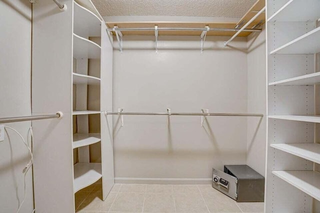 1127 Boca Cove Ln Unit 3, Highland Beach, FL 33487 - spacious closet with tile patterned flooring