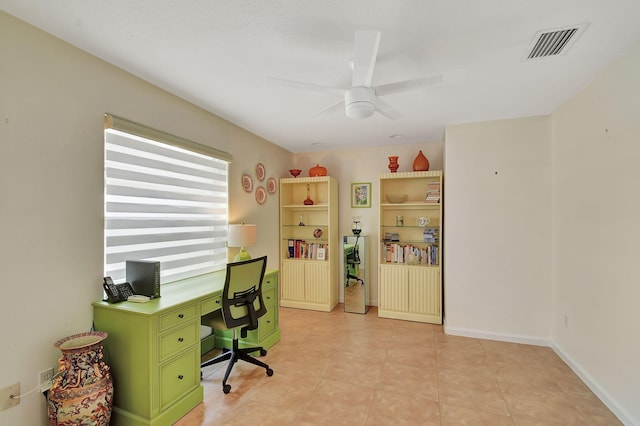 office space with ceiling fan